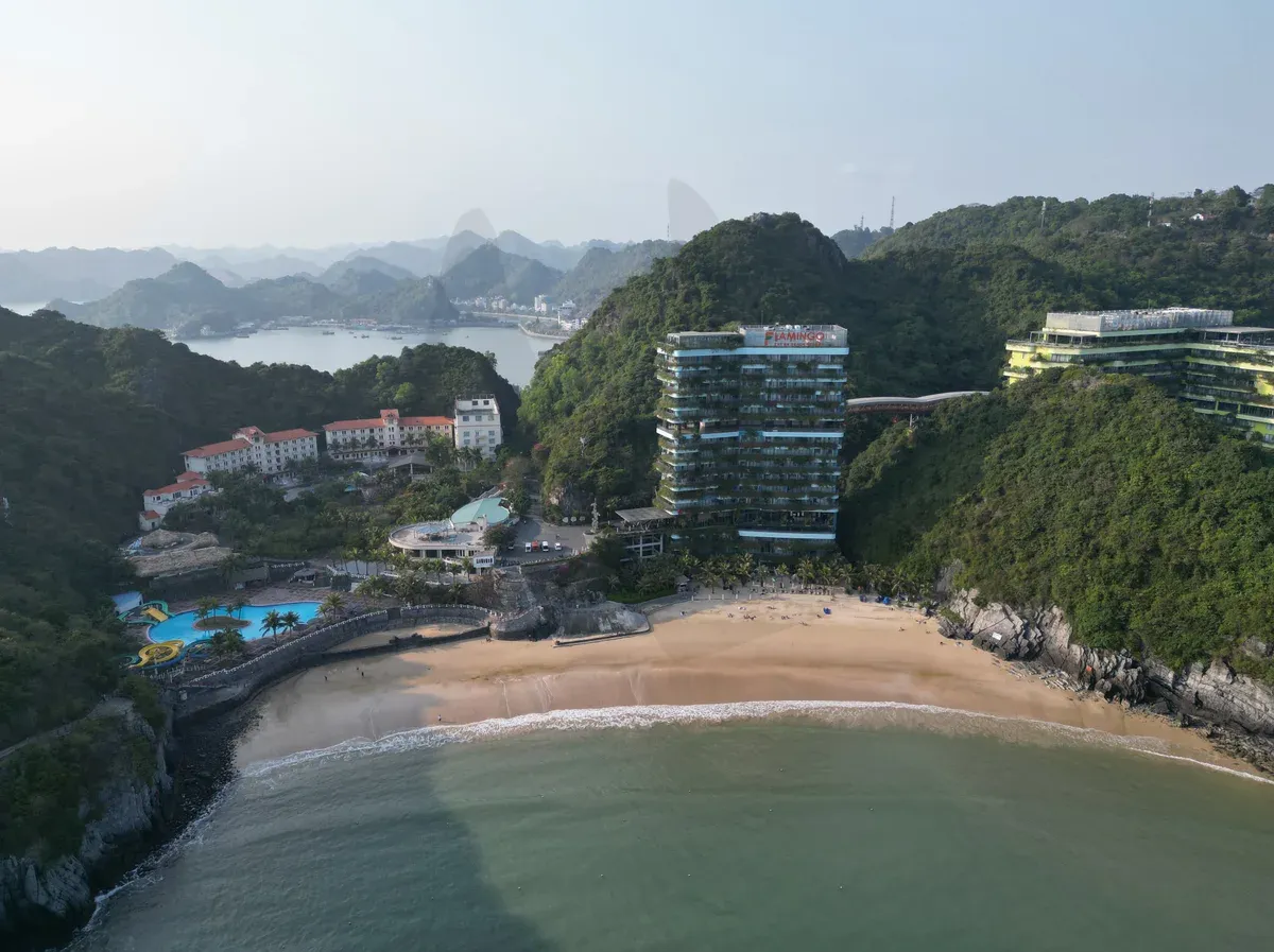 Cat Co beach and hotels on Cat Ba Island seen from above, Halong Bay cruise